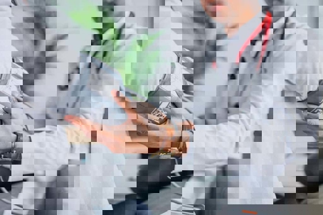 someone getting their blood pressure checked by a doctor